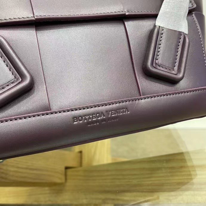 bo*te*ga Ve*ne*ta arco small bag in grape intrecciato calfskin