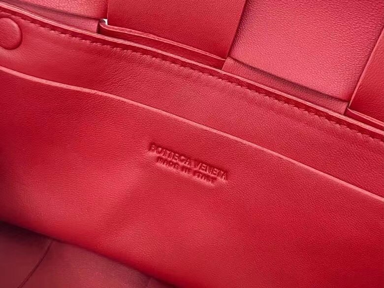 bo*te*ga Ve*ne*ta cassette belt bag in red intrecciato leather