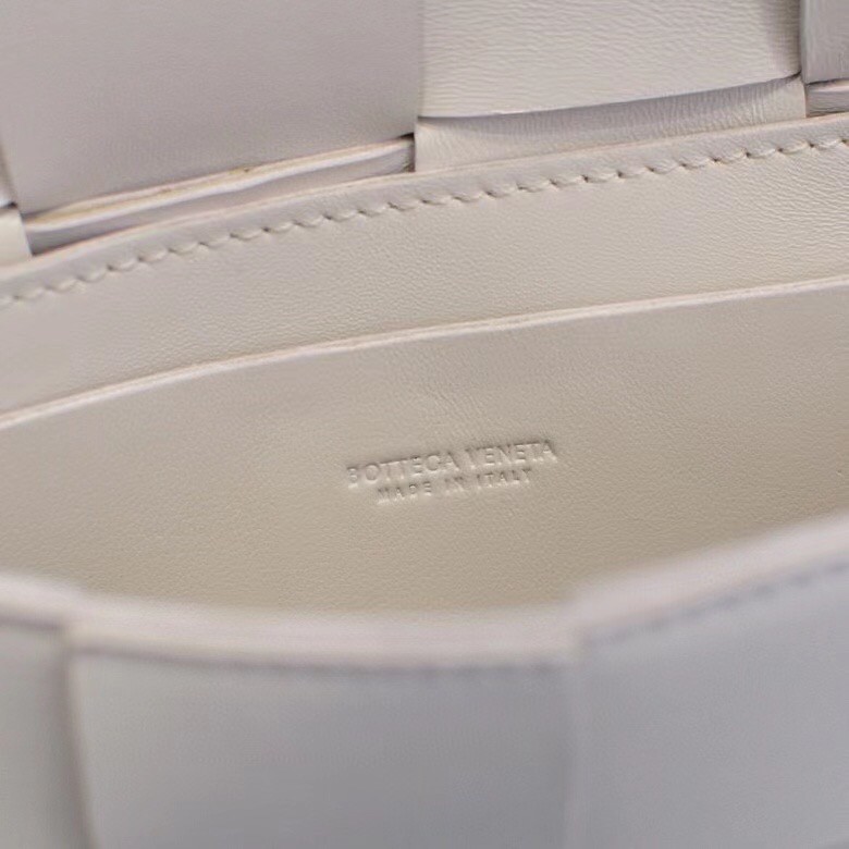 bo*te*ga Ve*ne*ta cassette belt bag in white intrecciato leather