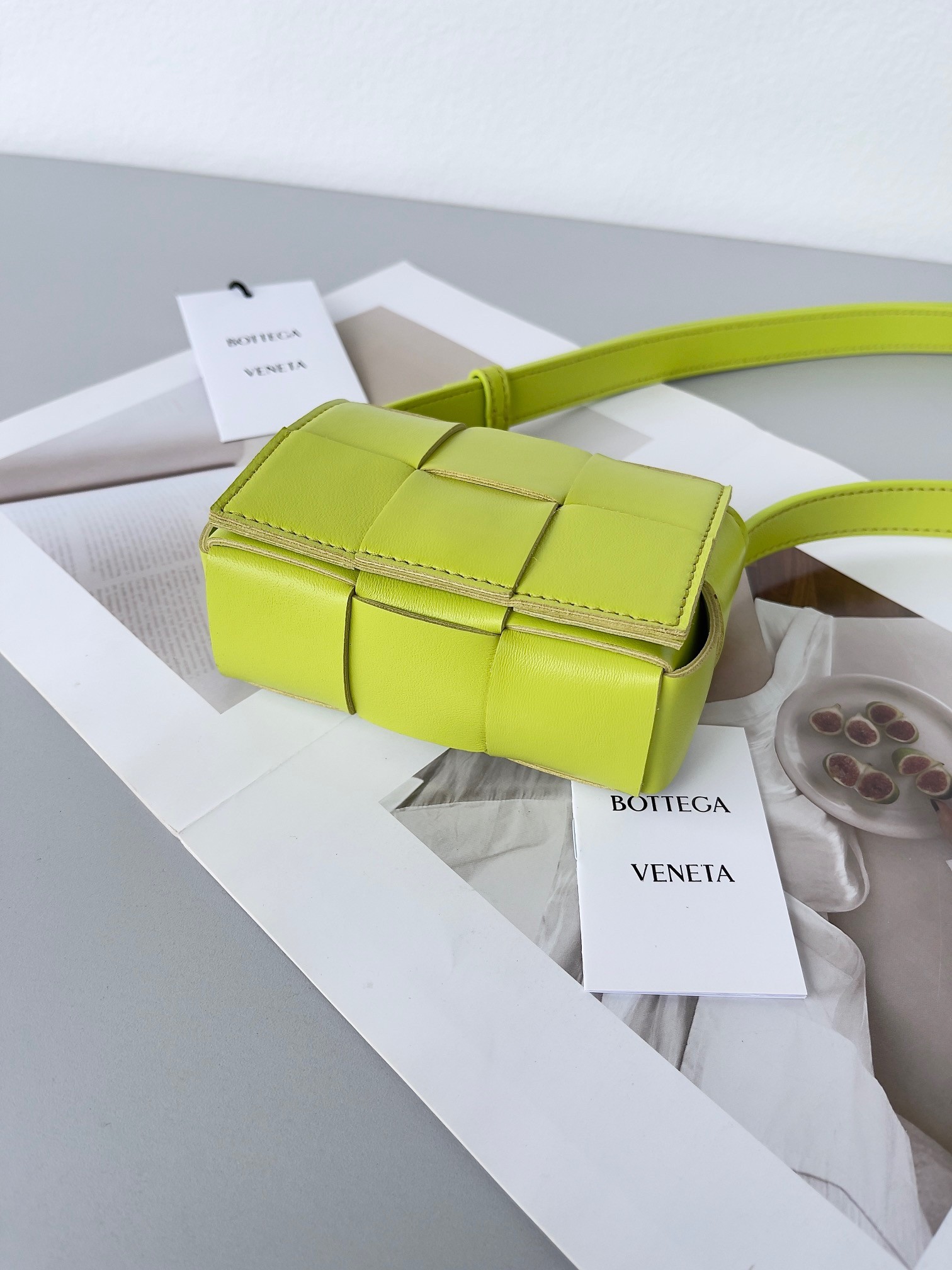 bo*te*ga Ve*ne*ta candy cassette bag in acid kiwi lambskin