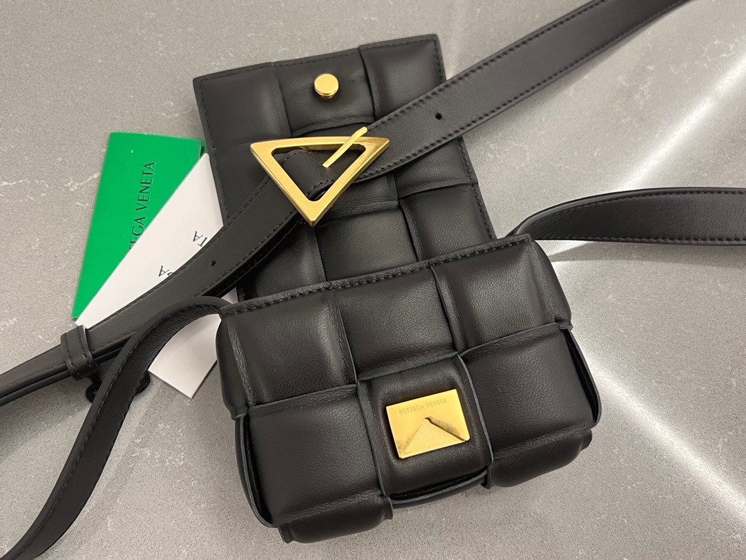 bo*te*ga Ve*ne*ta candy padded cassette bag in black lambskin