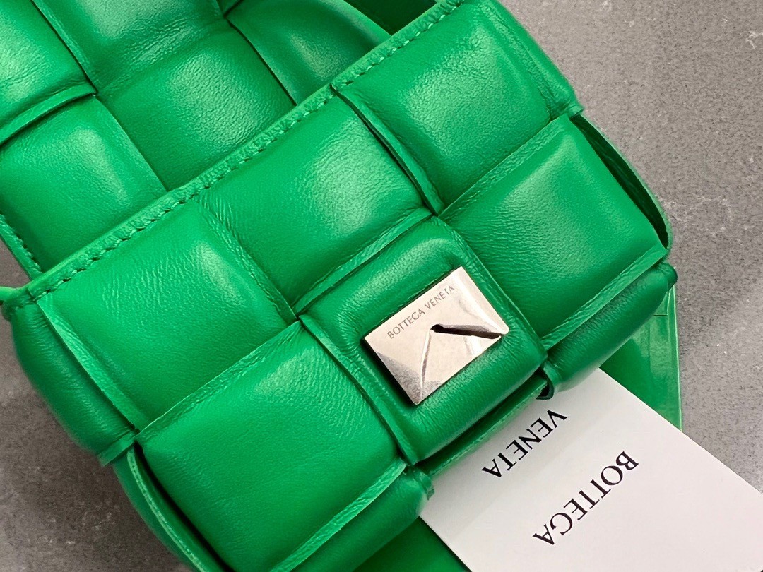 bo*te*ga Ve*ne*ta candy padded cassette bag in parakeet lambskin