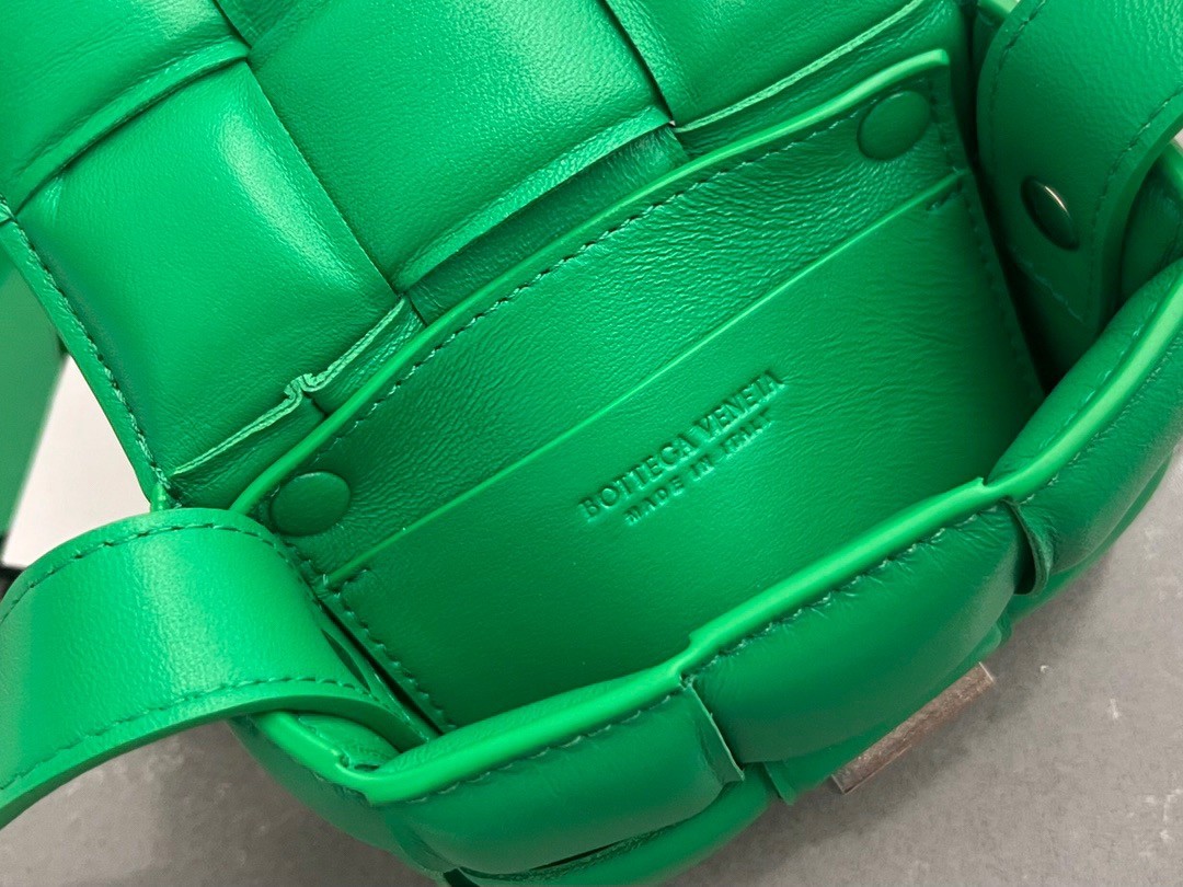 bo*te*ga Ve*ne*ta candy padded cassette bag in parakeet lambskin