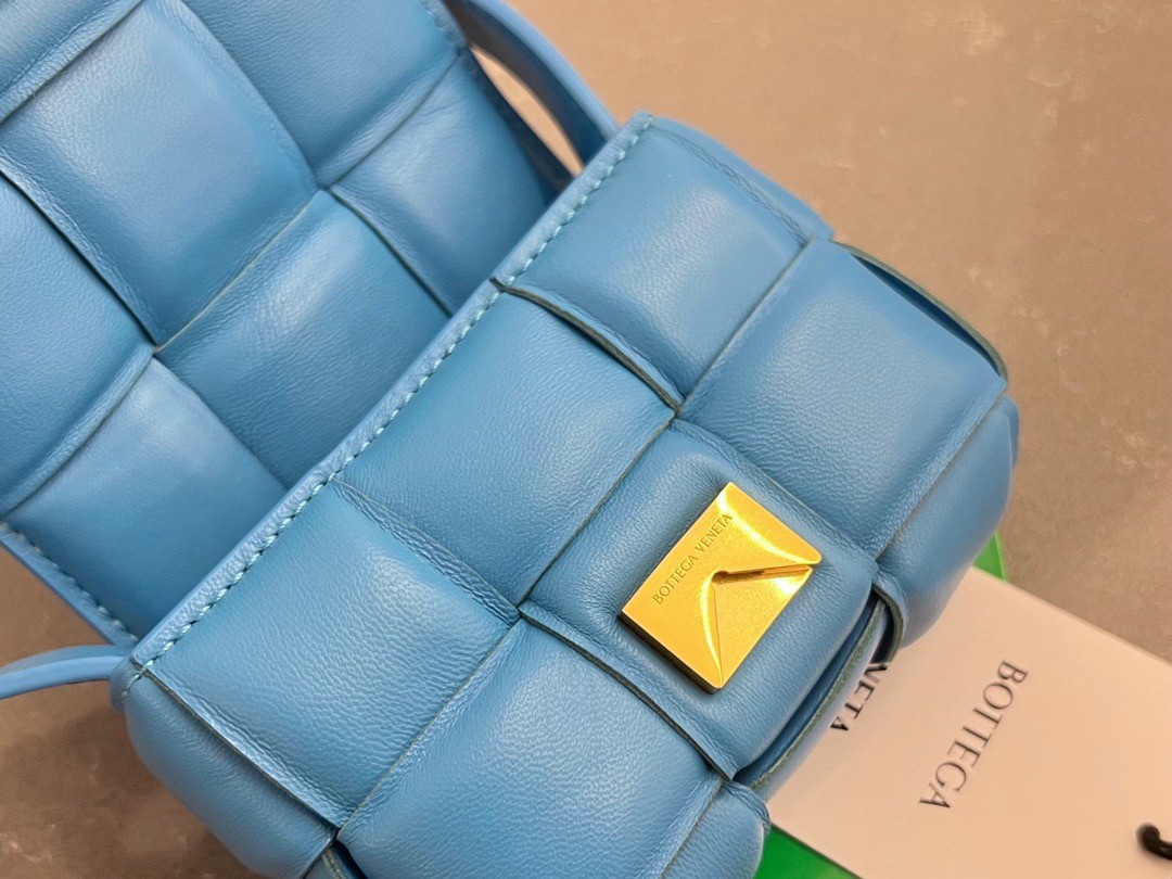 bo*te*ga Ve*ne*ta candy padded cassette bag in pool lambskin