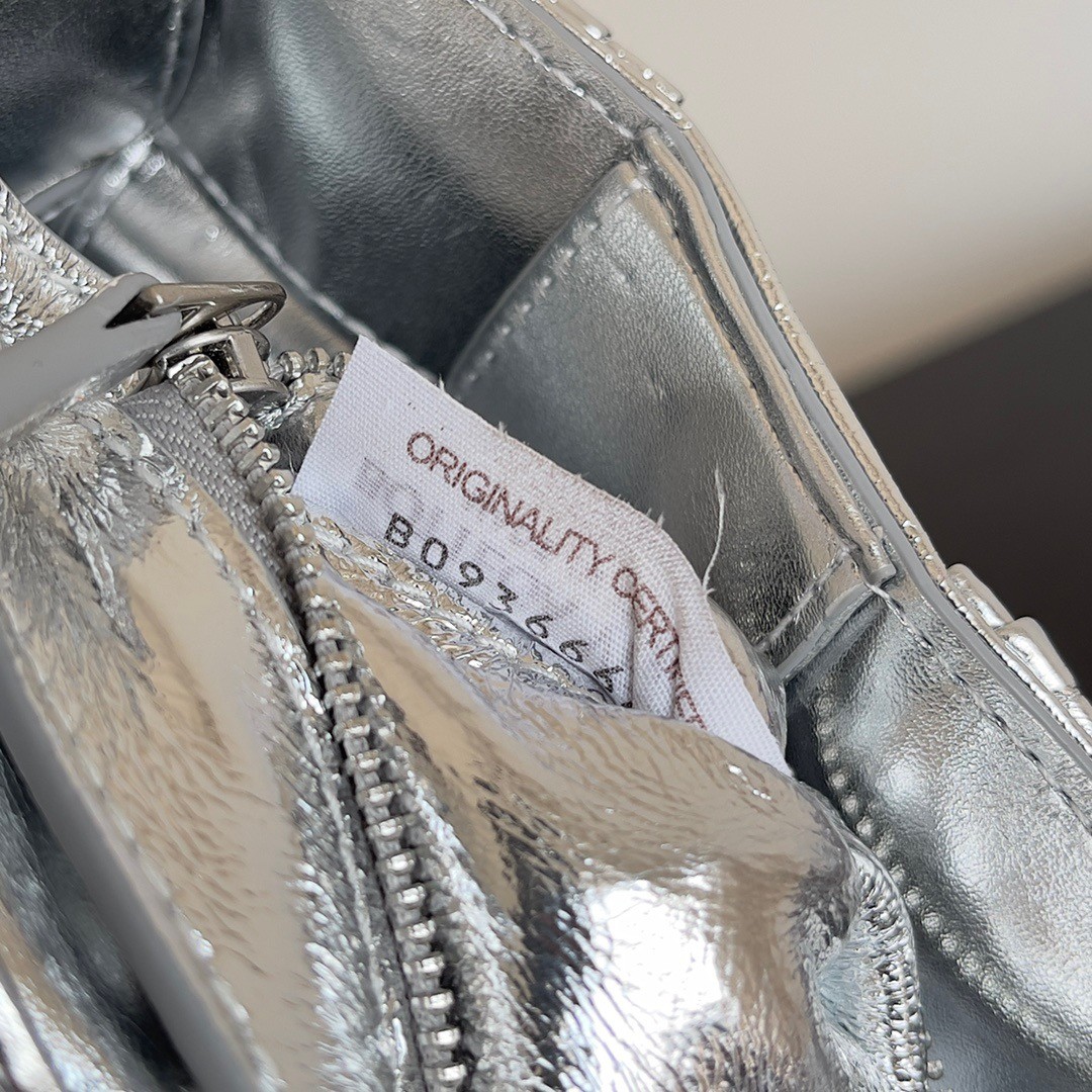 bo*te*ga Ve*ne*ta small cassette bag in silver metallic lambskin