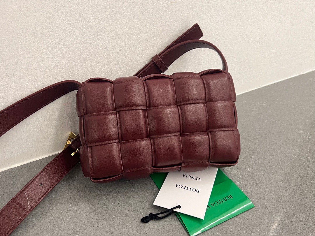 bo*te*ga Ve*ne*ta small padded cassette bag in barolo lambskin