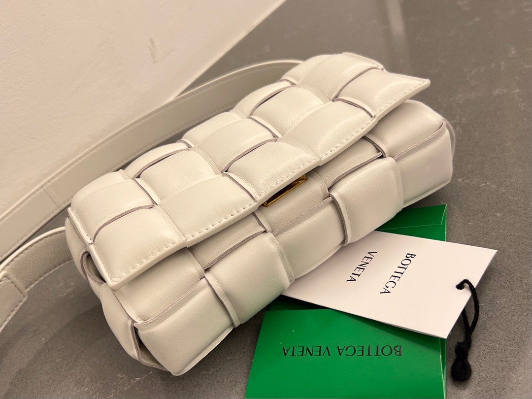 bo*te*ga Ve*ne*ta small padded cassette bag in white lambskin