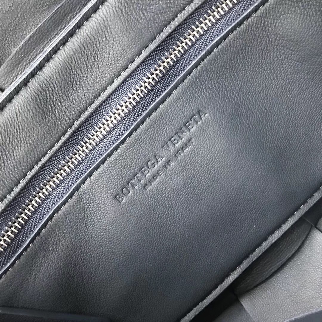 bo*te*ga Ve*ne*ta cassette bag in dark blue lambskin