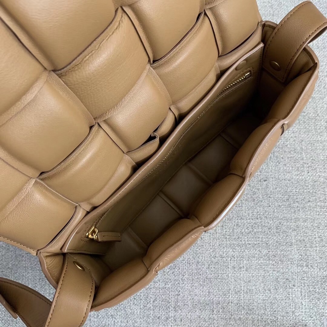 bo*te*ga Ve*ne*ta padded cassette bag in caramel calfskin