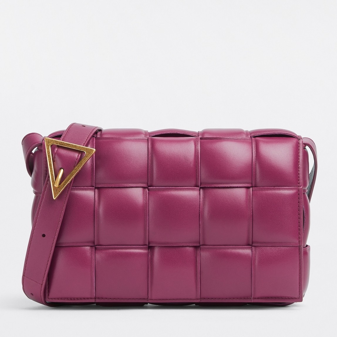 bo*te*ga Ve*ne*ta padded cassette bag in cinnabar calfskin