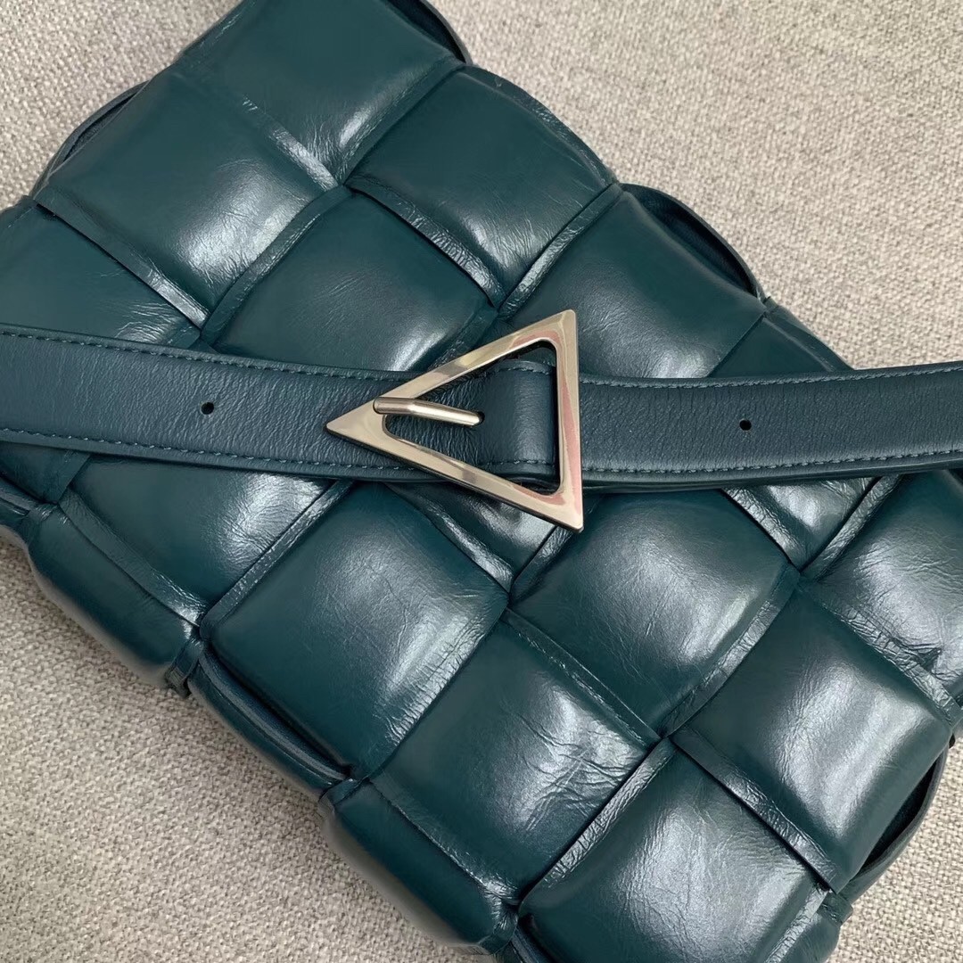 bo*te*ga Ve*ne*ta padded cassette bag in green calfskin