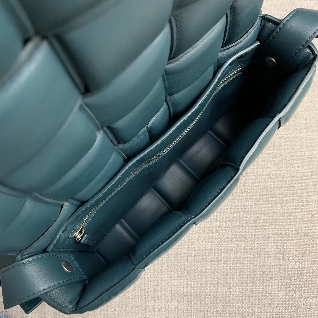 bo*te*ga Ve*ne*ta padded cassette bag in green calfskin