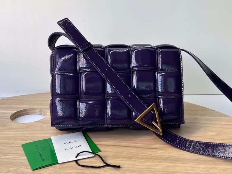 bo*te*ga Ve*ne*ta padded cassette bag in raisin deerskin
