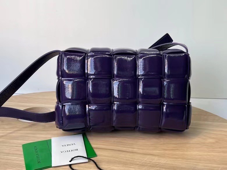 bo*te*ga Ve*ne*ta padded cassette bag in raisin deerskin