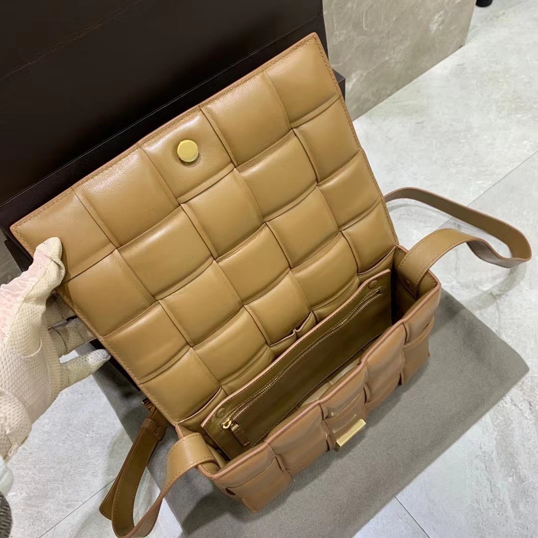 bo*te*ga Ve*ne*ta padded cassette bag in caramel lambskin