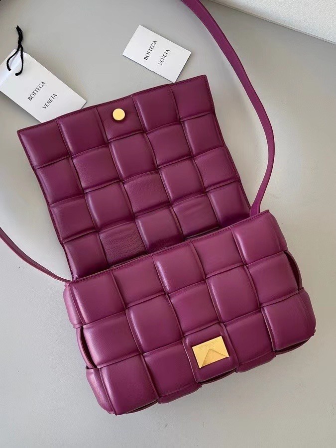 bo*te*ga Ve*ne*ta padded cassette bag in cinnabar lambskin