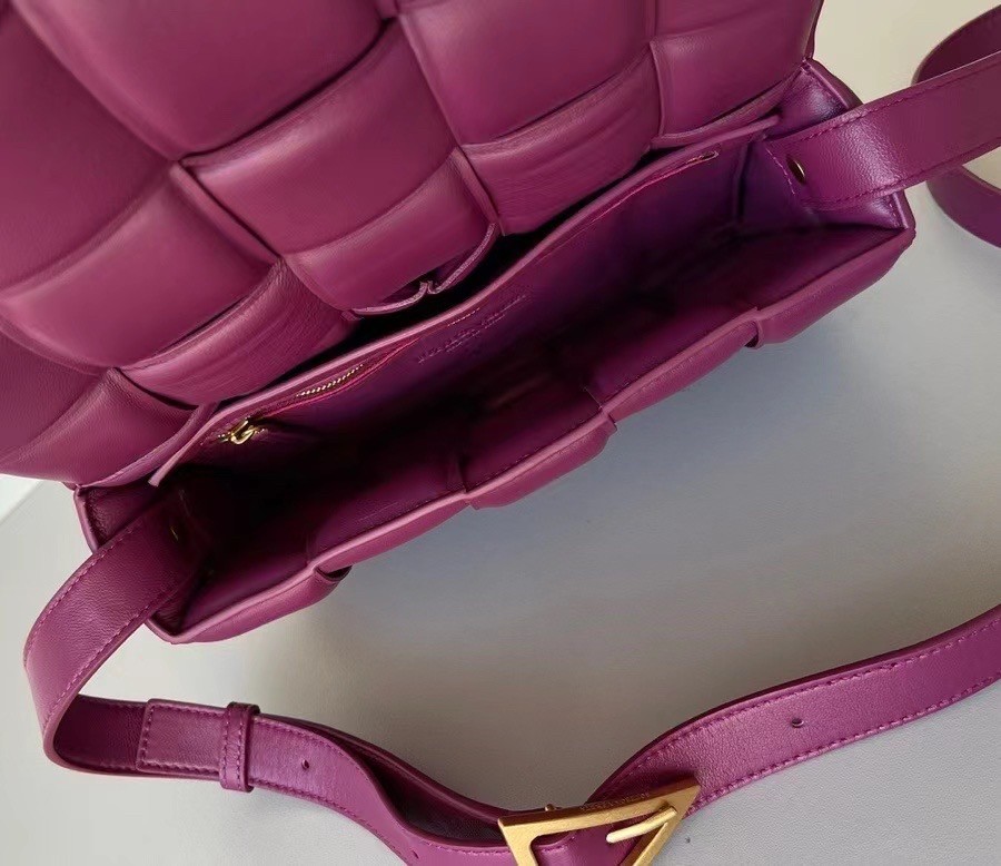 bo*te*ga Ve*ne*ta padded cassette bag in cinnabar lambskin