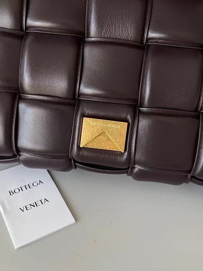 bo*te*ga Ve*ne*ta padded cassette bag in fondant lambskin