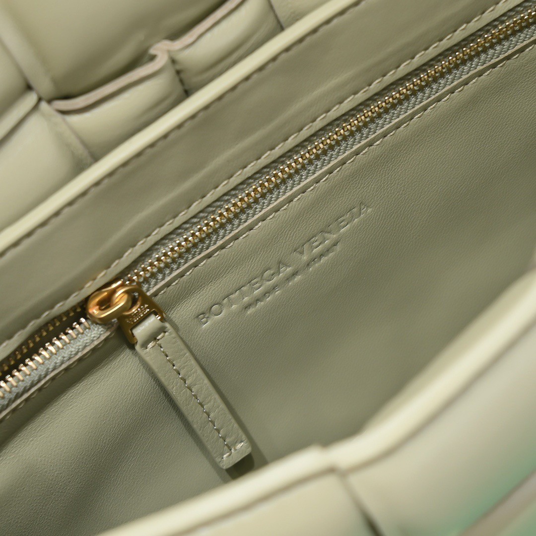 bo*te*ga Ve*ne*ta padded cassette bag in travertine lambskin