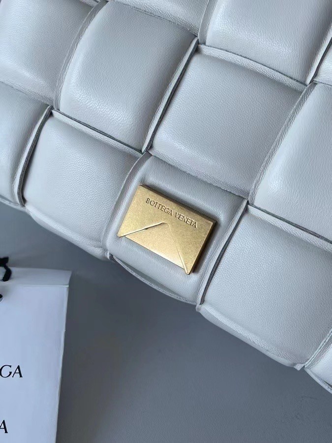 bo*te*ga Ve*ne*ta padded cassette bag in white lambskin