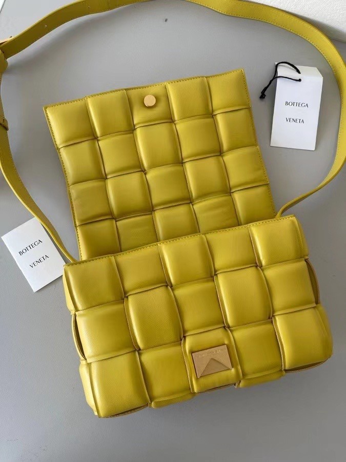 bo*te*ga Ve*ne*ta padded cassette bag in yellow lambskin