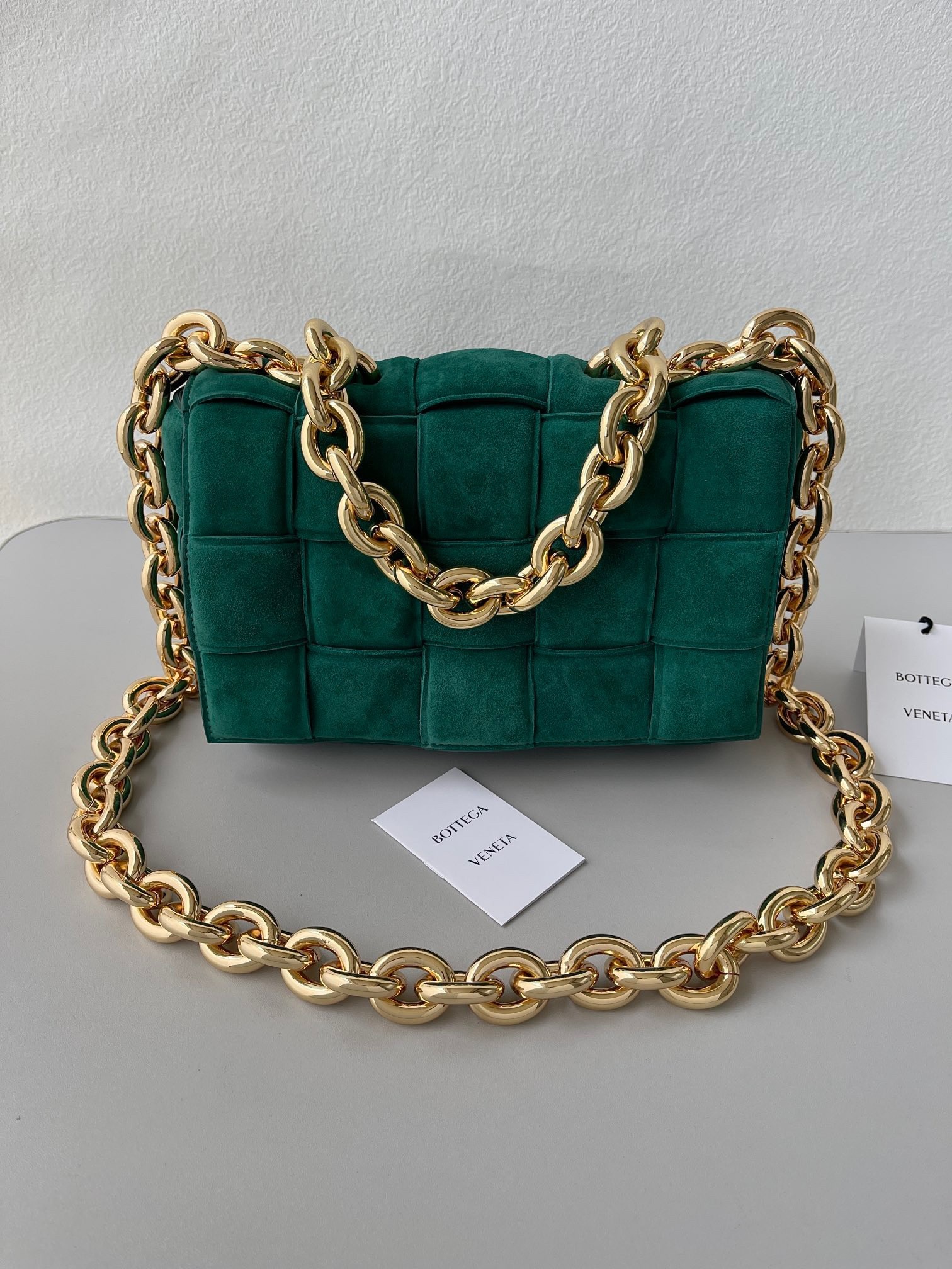 bo*te*ga Ve*ne*ta chain cassette bag in emerald green suede