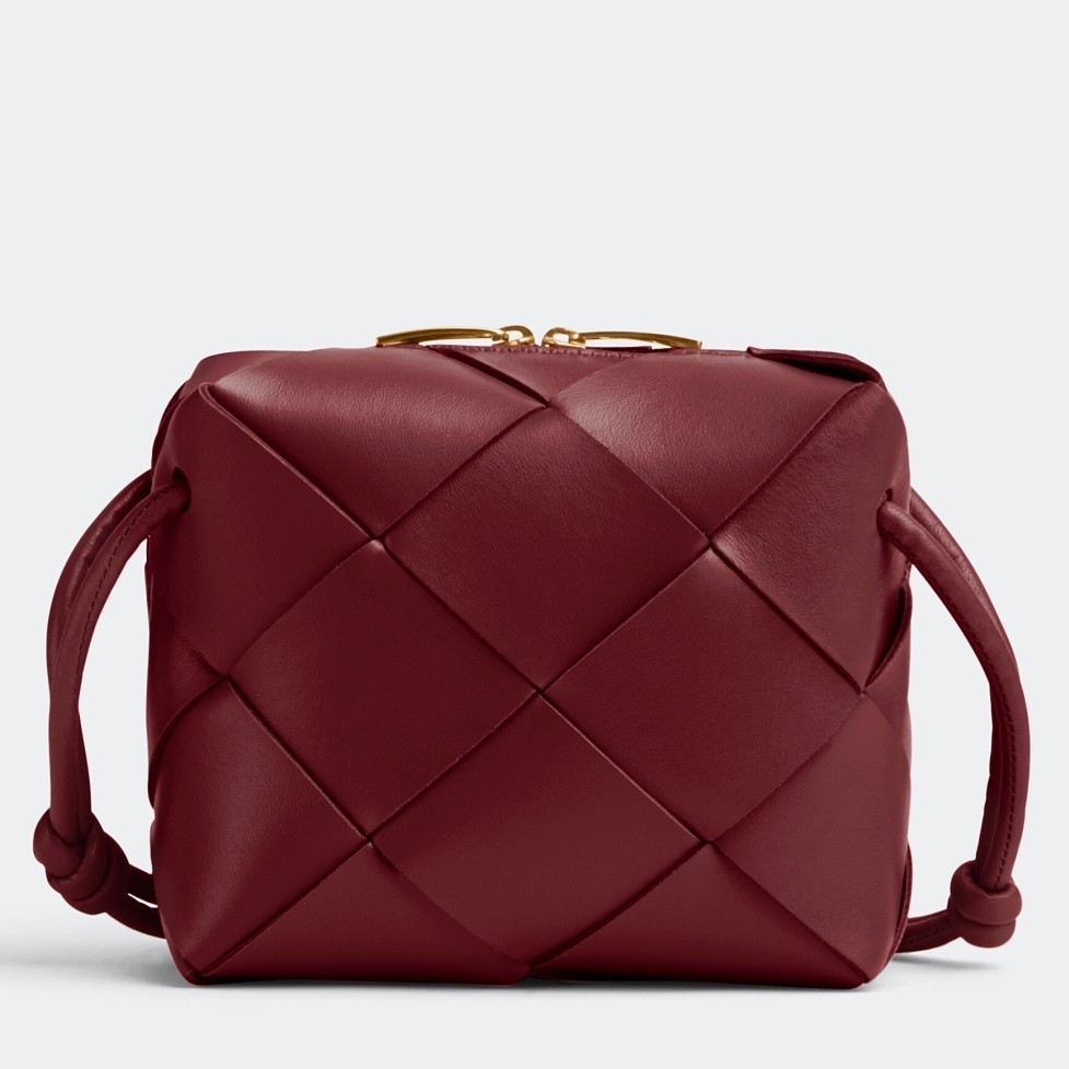 bo*te*ga Ve*ne*ta mini cassette camera bag in bordeaux lambskin