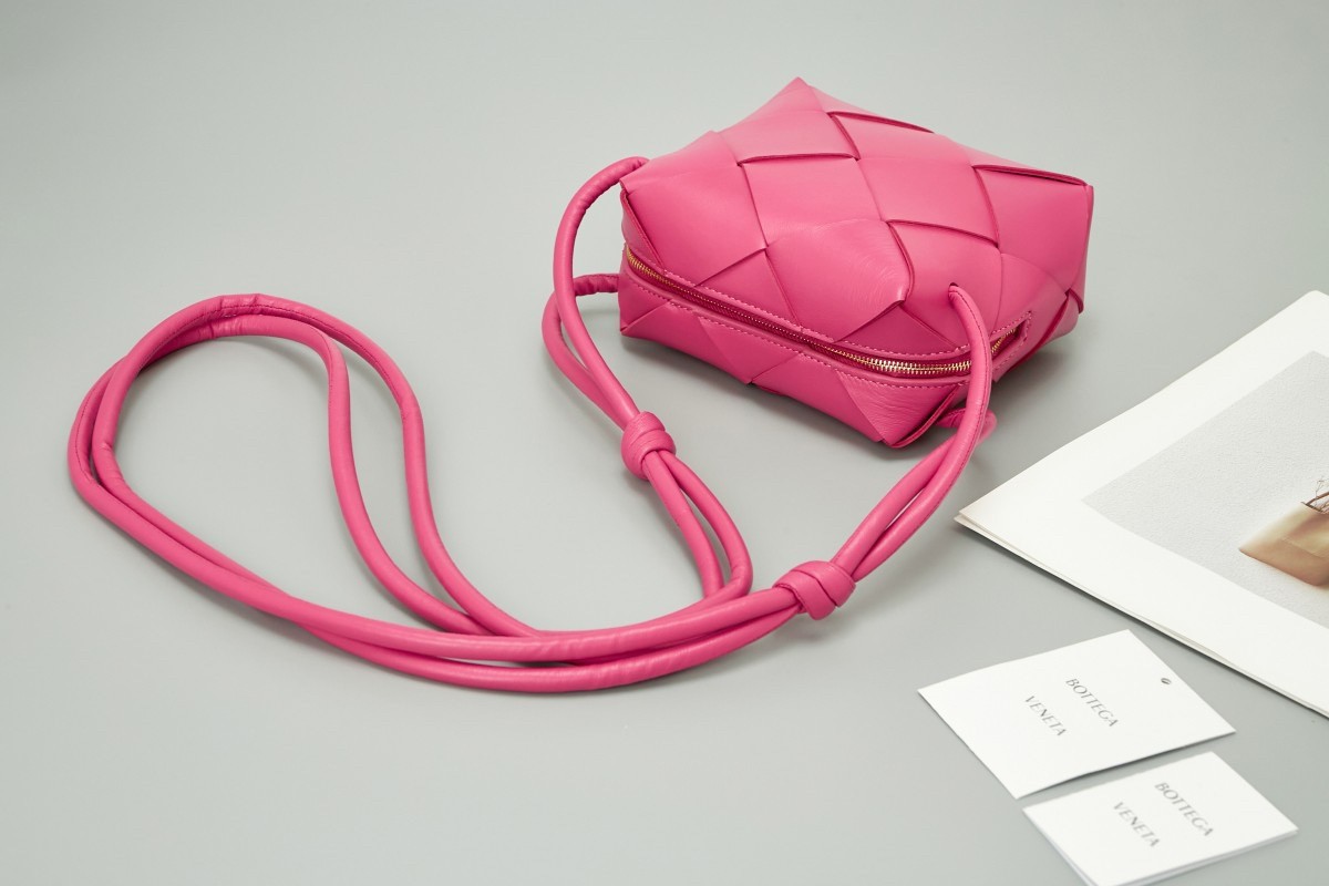 bo*te*ga Ve*ne*ta mini cassette camera bag in cranberry lambskin