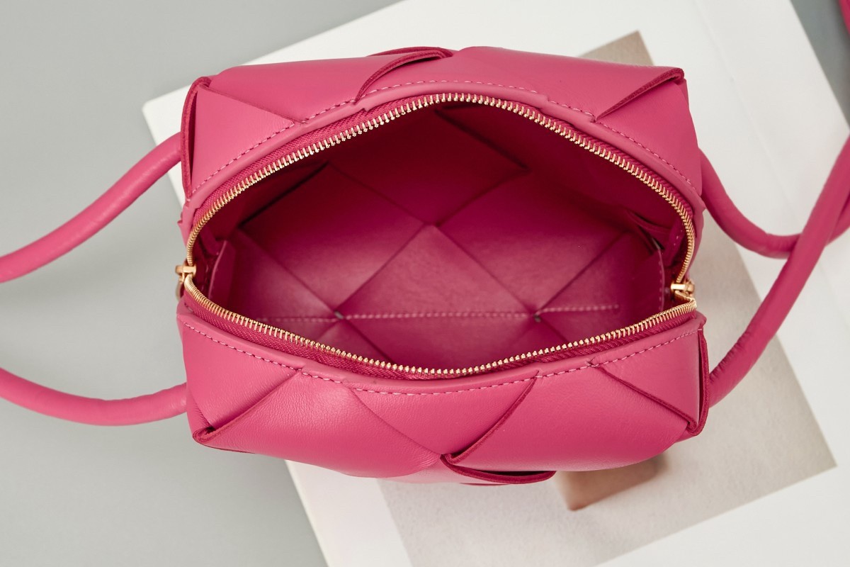 bo*te*ga Ve*ne*ta mini cassette camera bag in cranberry lambskin