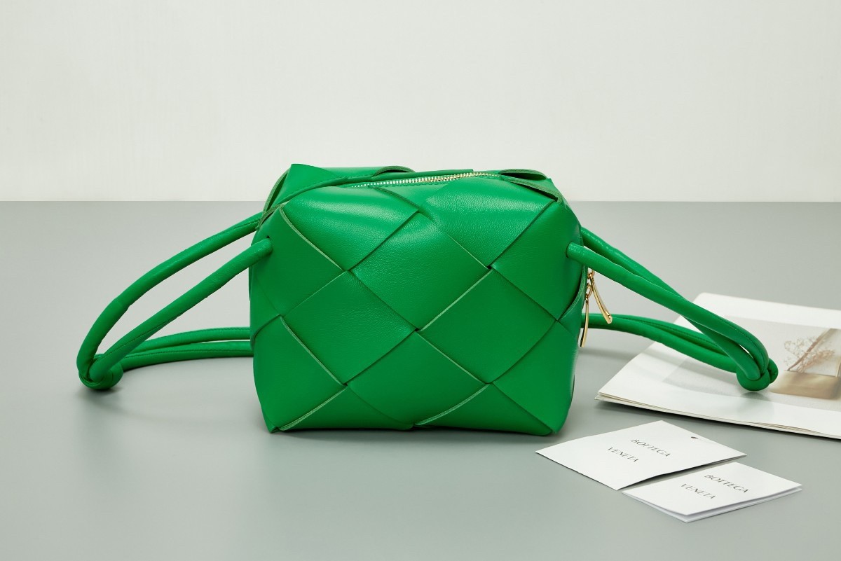 bo*te*ga Ve*ne*ta mini cassette camera bag in parakeet lambskin