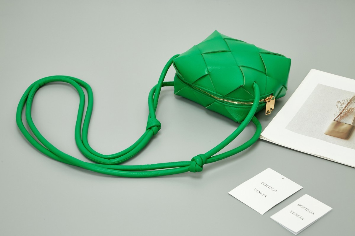 bo*te*ga Ve*ne*ta mini cassette camera bag in parakeet lambskin