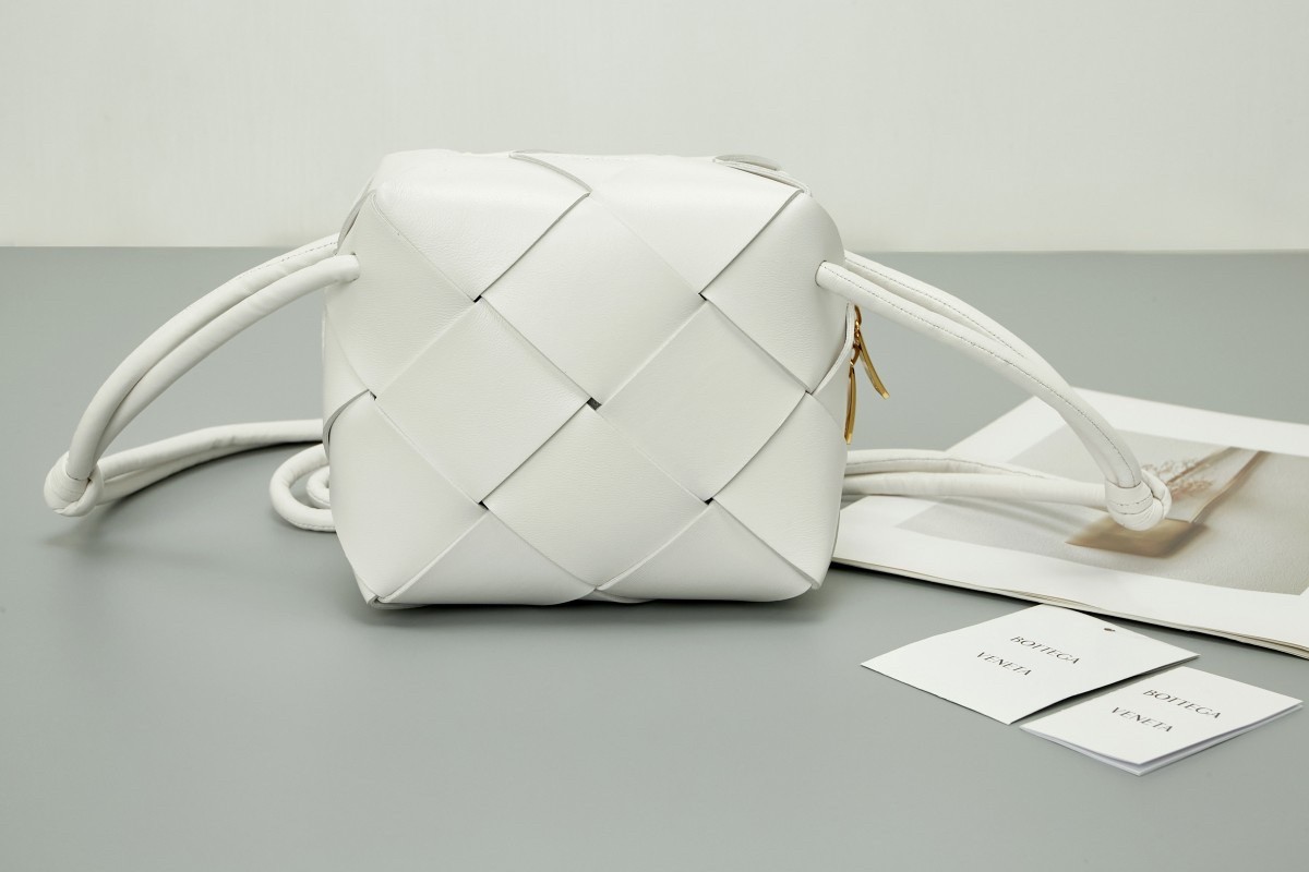 bo*te*ga Ve*ne*ta mini cassette camera bag in white lambskin