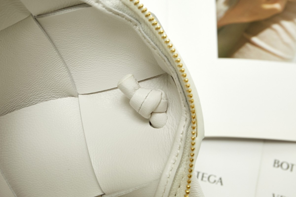 bo*te*ga Ve*ne*ta mini cassette camera bag in white lambskin
