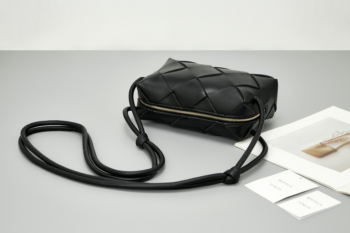 bo*te*ga Ve*ne*ta small cassette camera bag in black lambskin