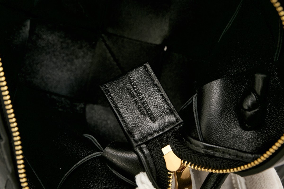 bo*te*ga Ve*ne*ta small cassette camera bag in black lambskin