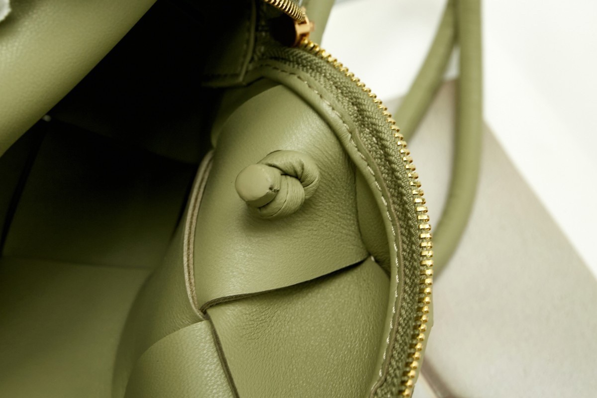 bo*te*ga Ve*ne*ta small cassette camera bag in travertine lambskin