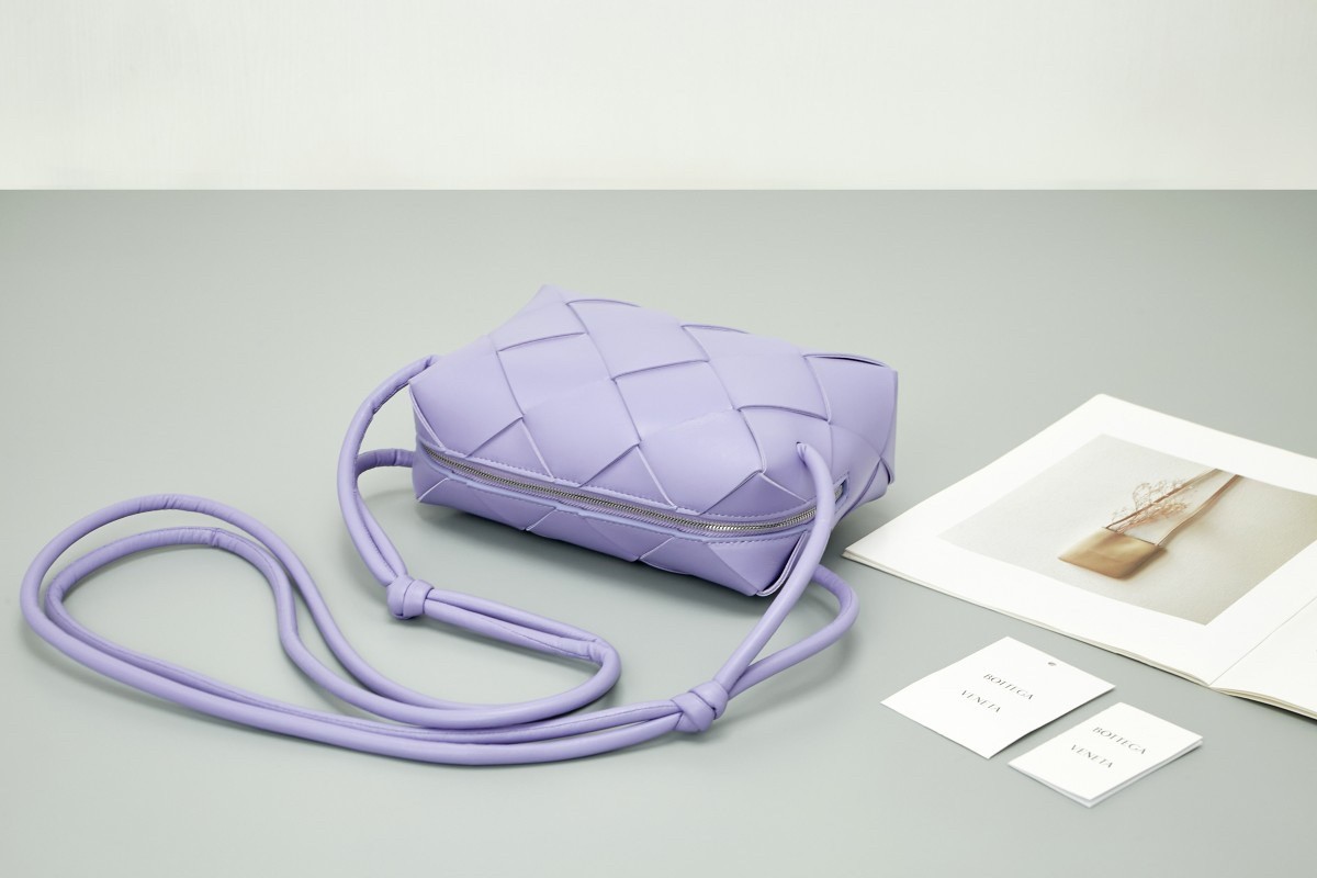 bo*te*ga Ve*ne*ta small cassette camera bag in wisteria lambskin