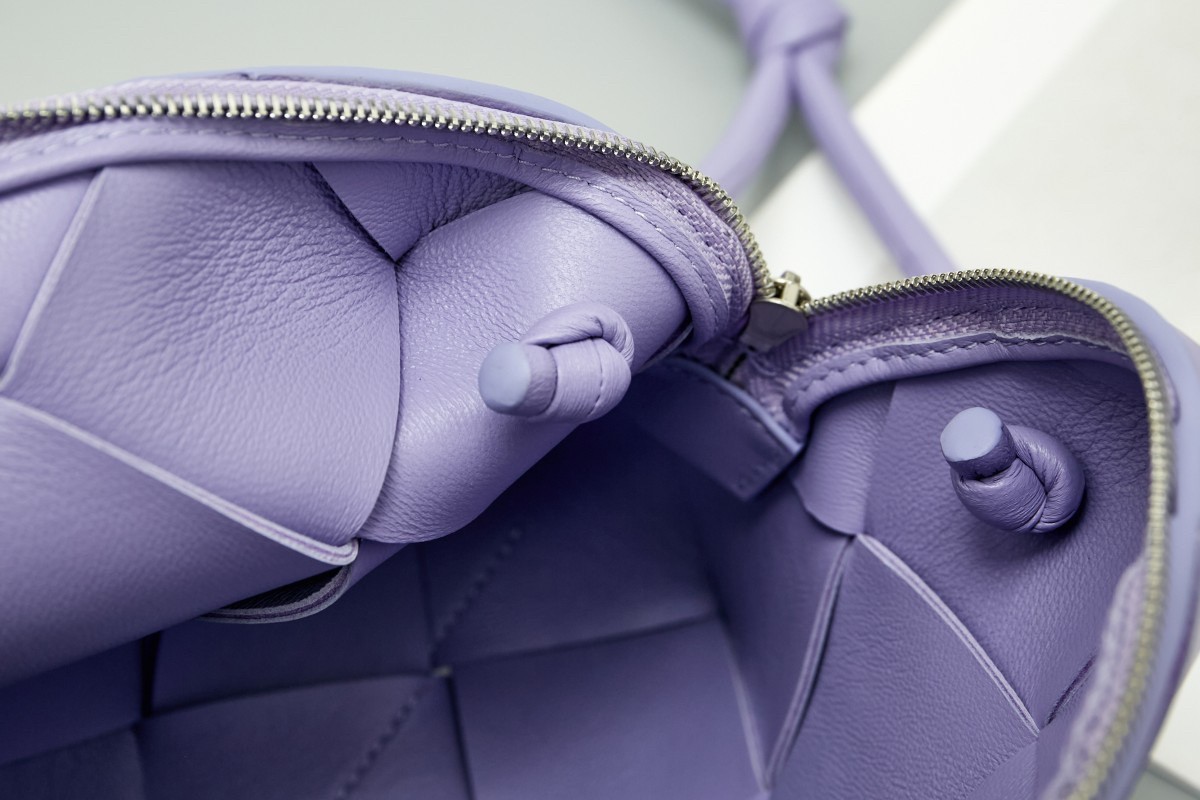 bo*te*ga Ve*ne*ta small cassette camera bag in wisteria lambskin