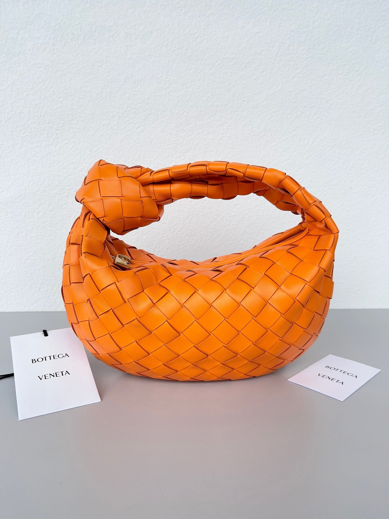 bo*te*ga Ve*ne*ta bv jodie mini bag in orange intrecciato lambskin