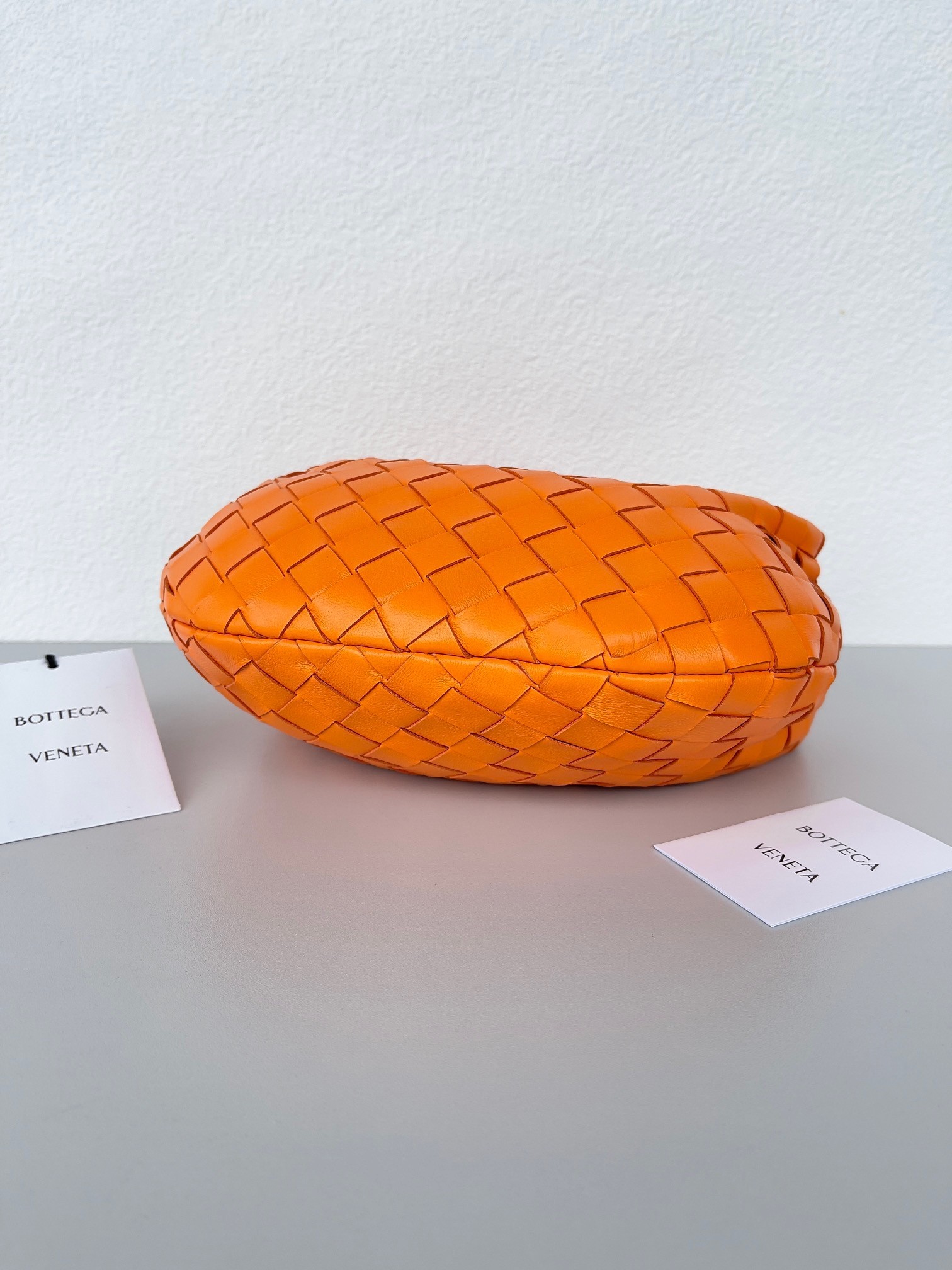 bo*te*ga Ve*ne*ta bv jodie mini bag in orange intrecciato lambskin