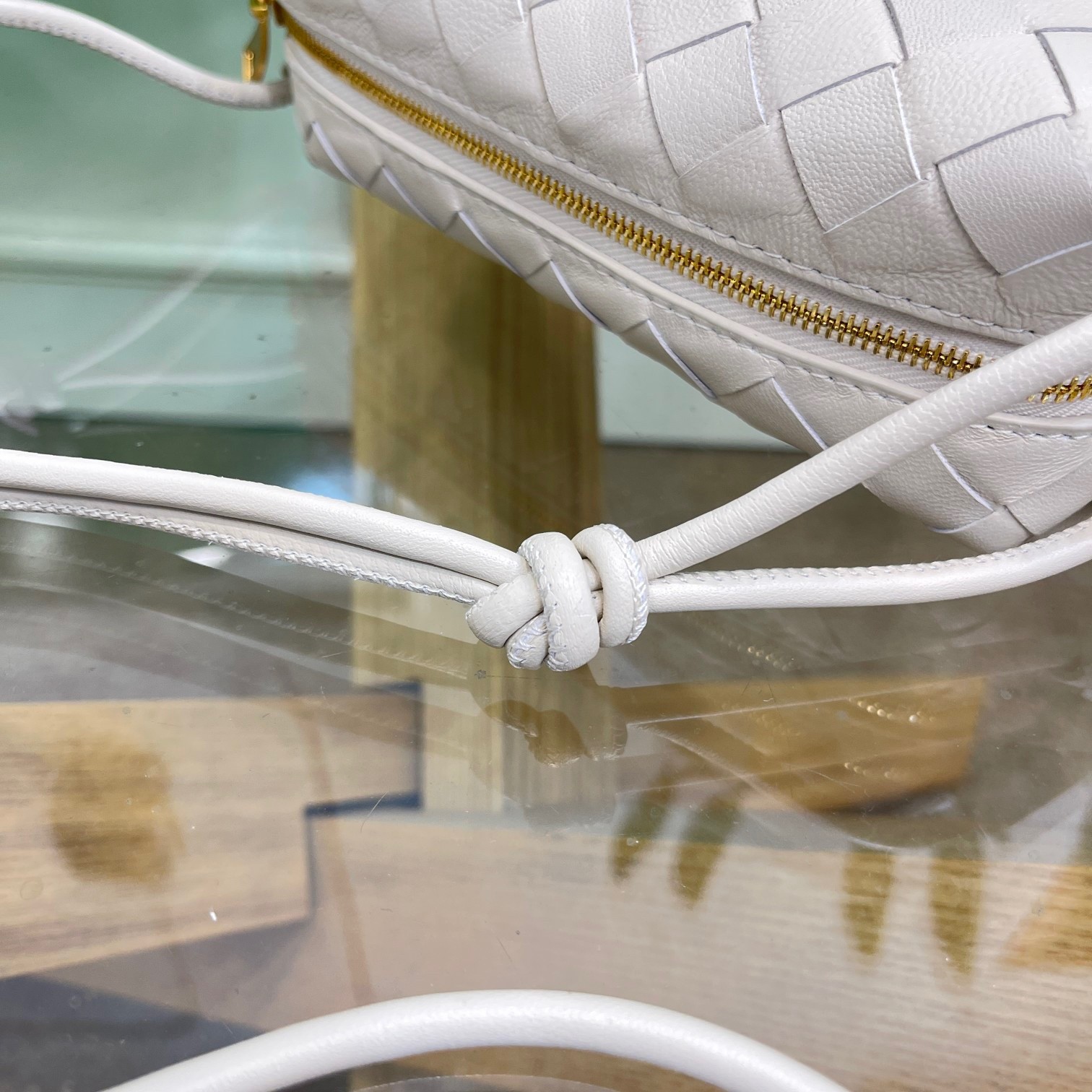 bo*te*ga Ve*ne*ta loop mini bag in white intrecciato lambskin
