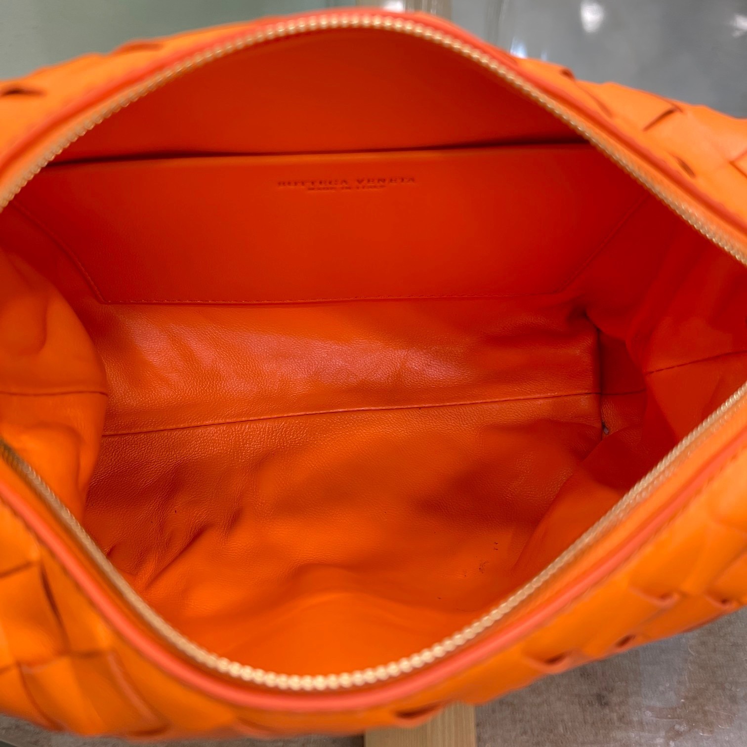 bo*te*ga Ve*ne*ta loop small bag in orange intrecciato lambskin