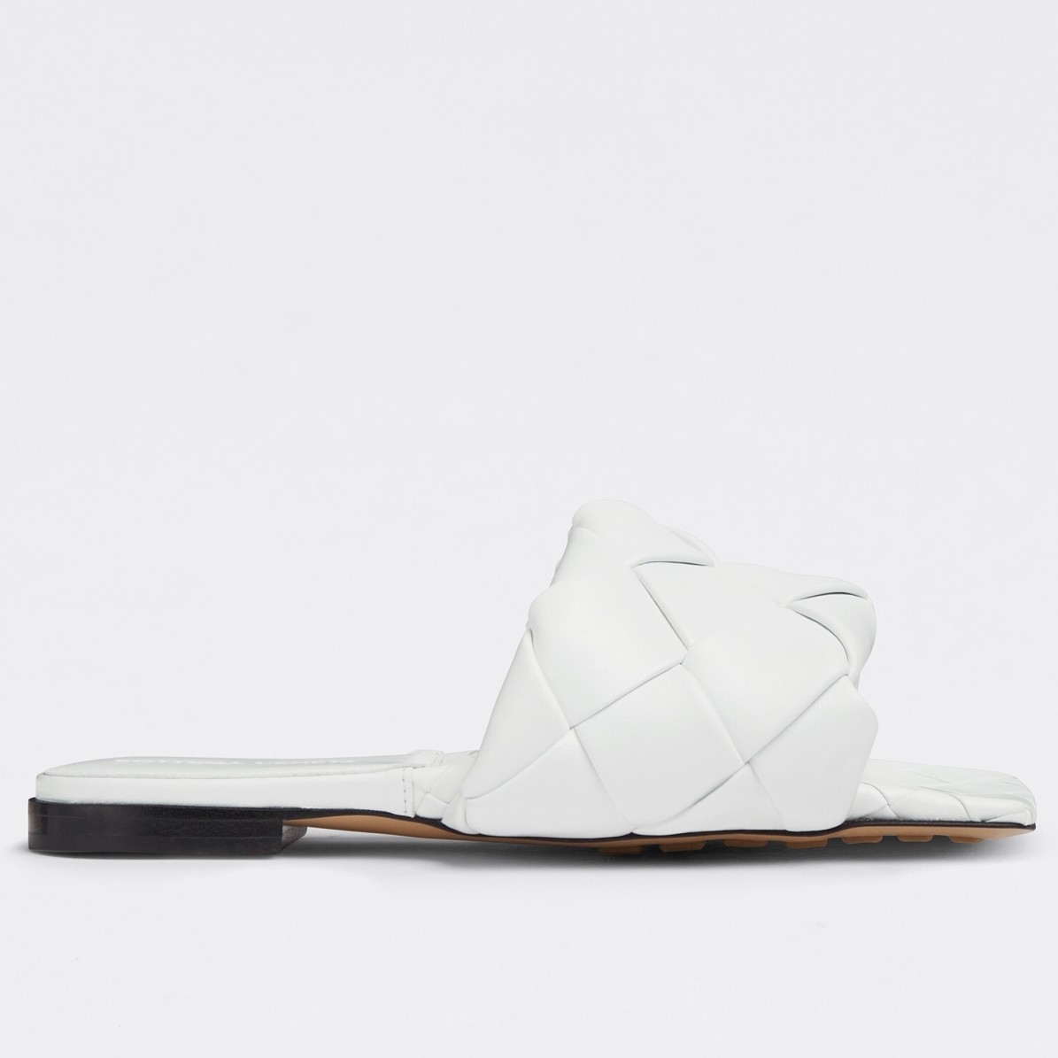 bo*te*ga Ve*ne*ta lido slides in white intreccio lambskin