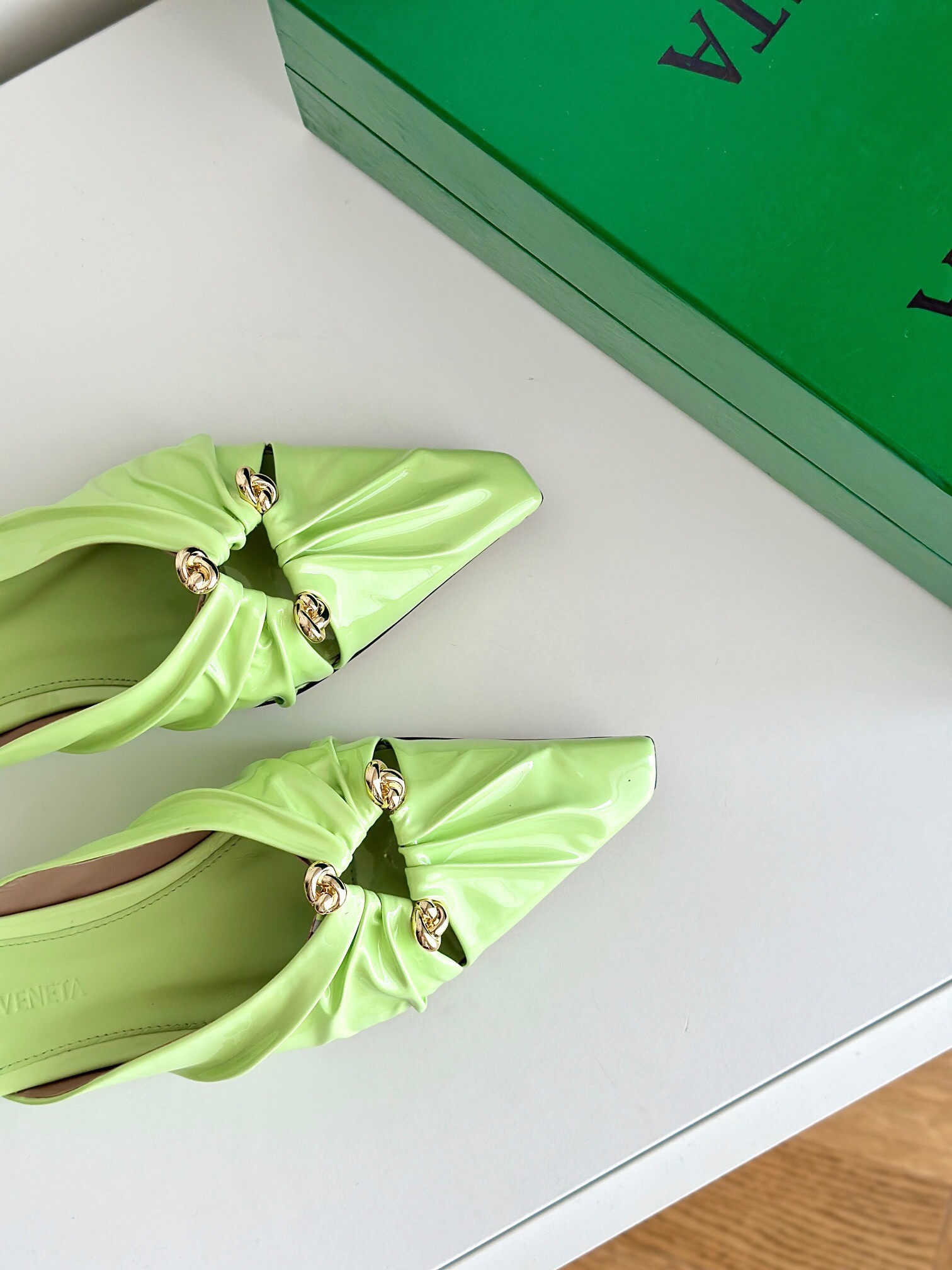 bo*te*ga Ve*ne*ta bunnie flat mules in fennel patent leather