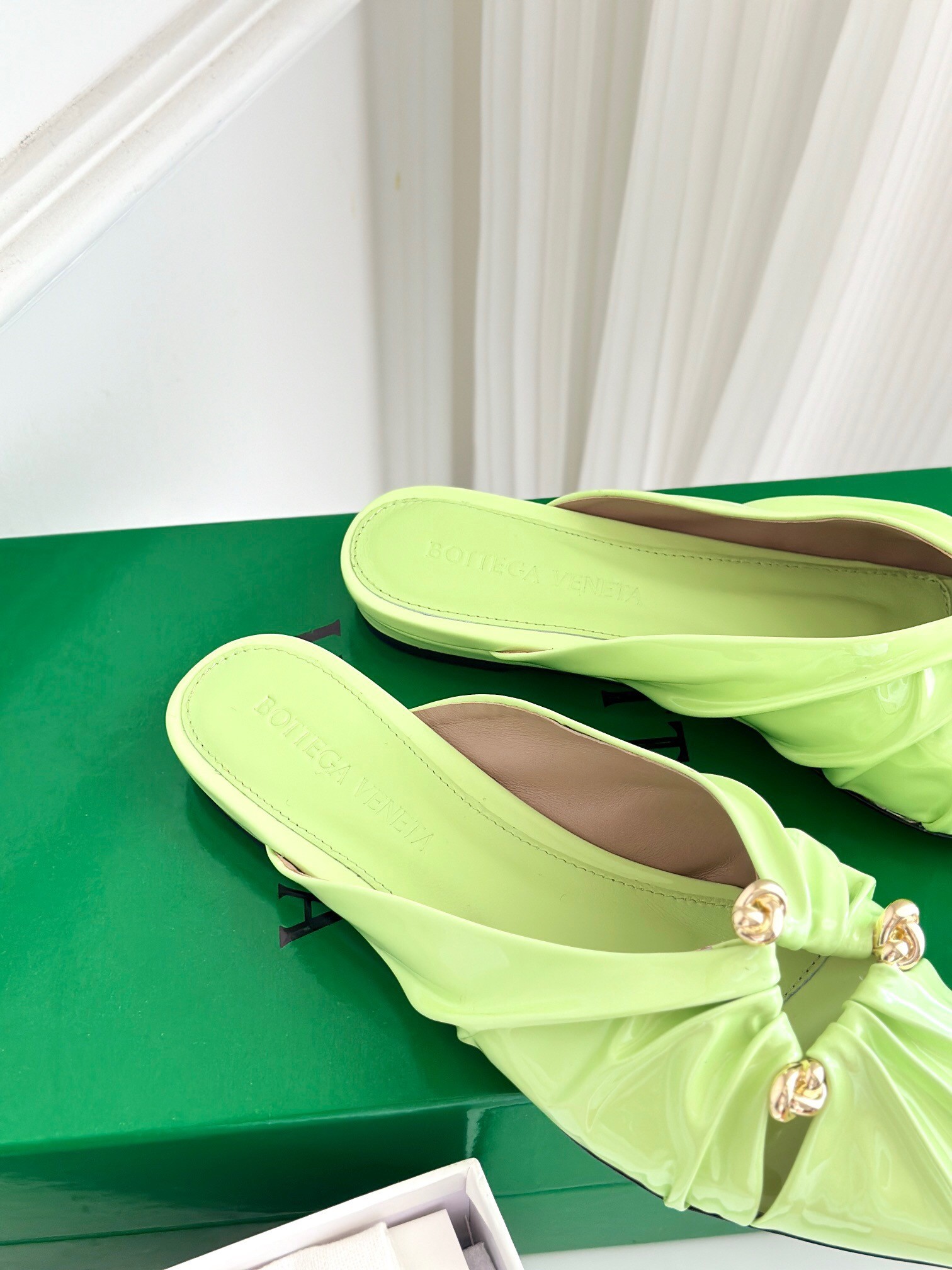 bo*te*ga Ve*ne*ta bunnie flat mules in fennel patent leather