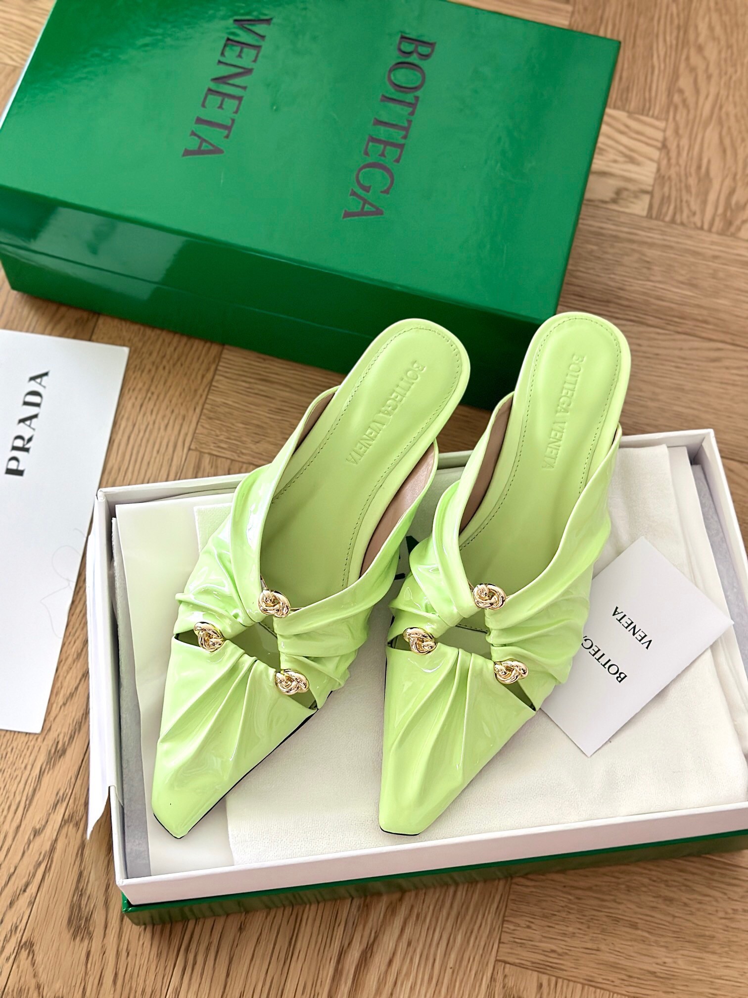 bo*te*ga Ve*ne*ta bunnie flat mules in fennel patent leather