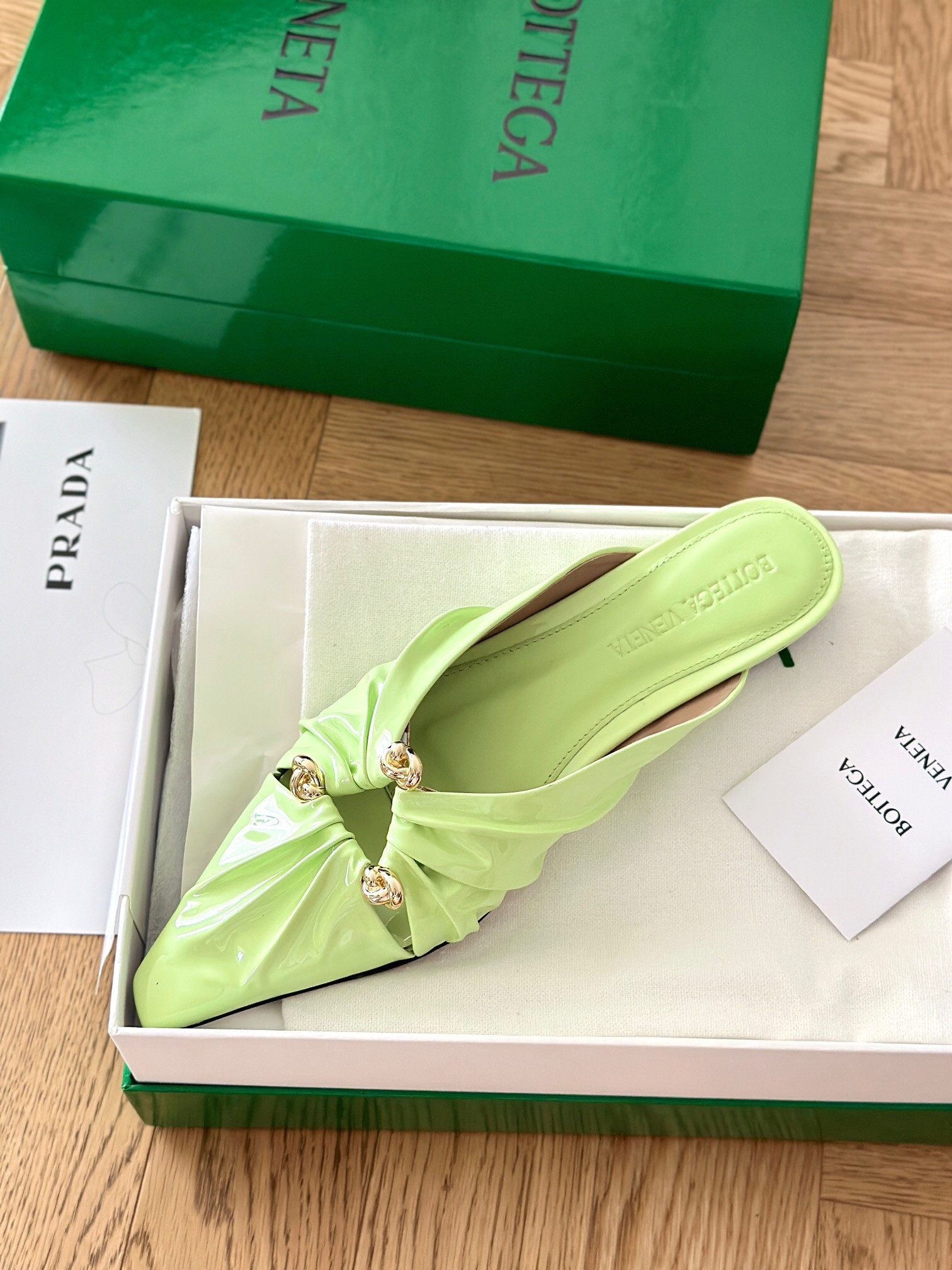 bo*te*ga Ve*ne*ta bunnie flat mules in fennel patent leather