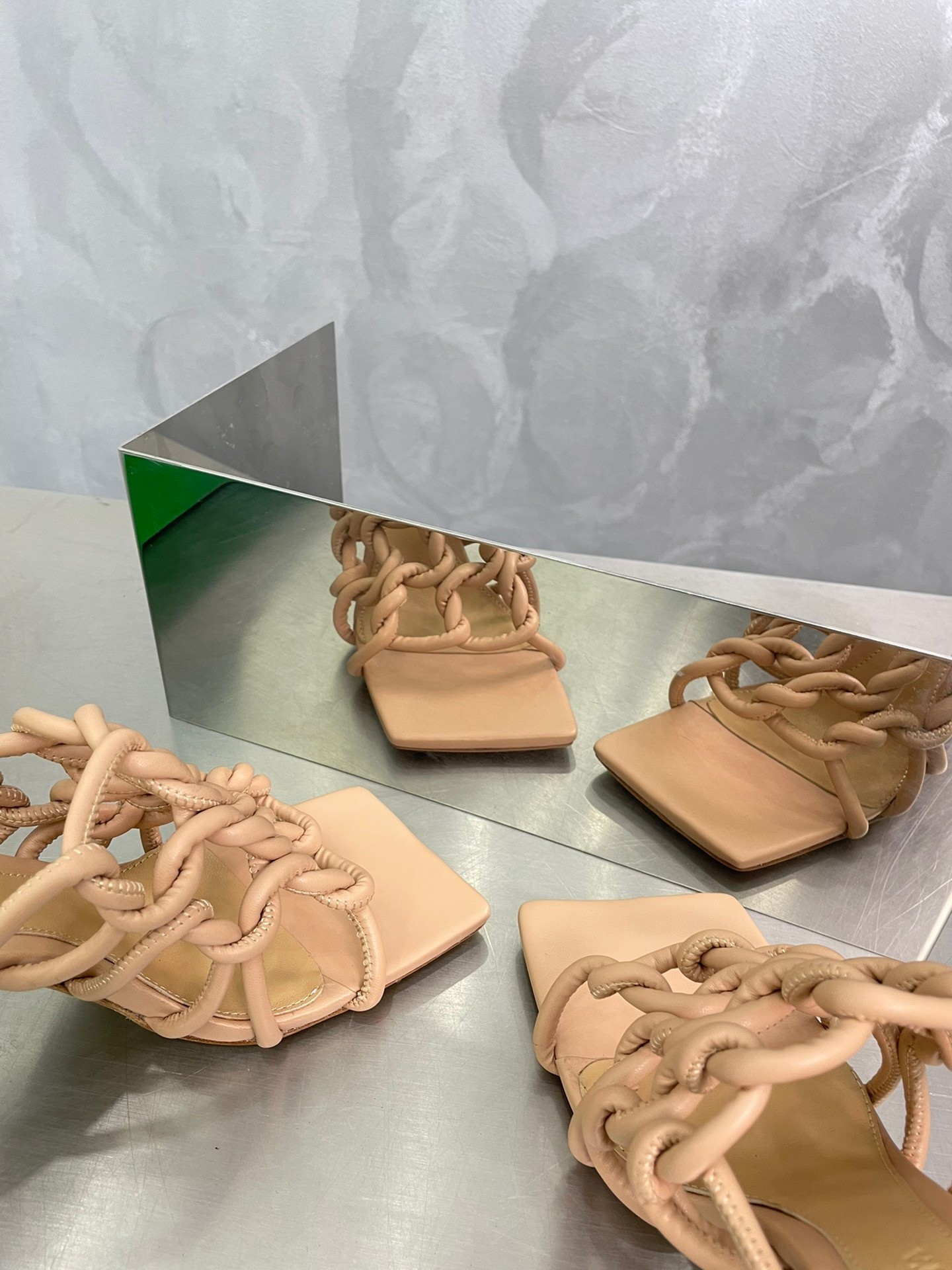 bo*te*ga Ve*ne*ta stretch twist sandals in beige lambskin
