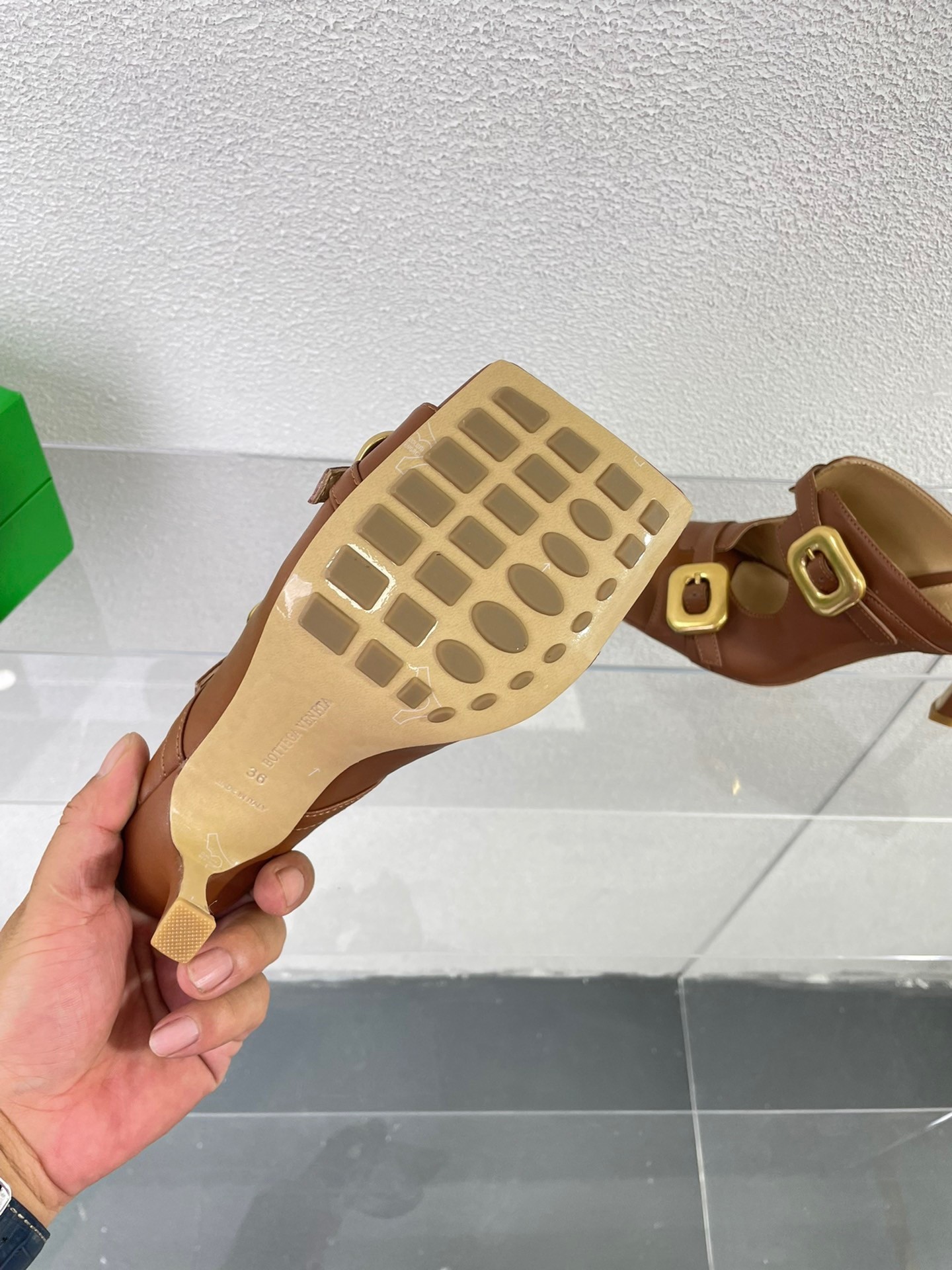 bo*te*ga Ve*ne*ta stretch buckle mules in caramel calfskin