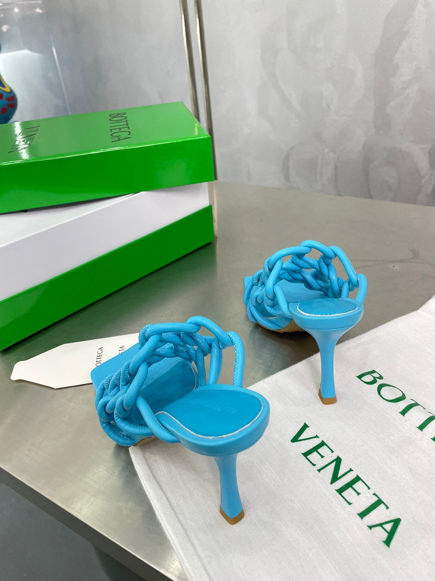 bo*te*ga Ve*ne*ta stretch twist sandals in blue lambskin